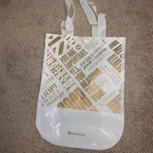 White and gold lulu lemon gift bag